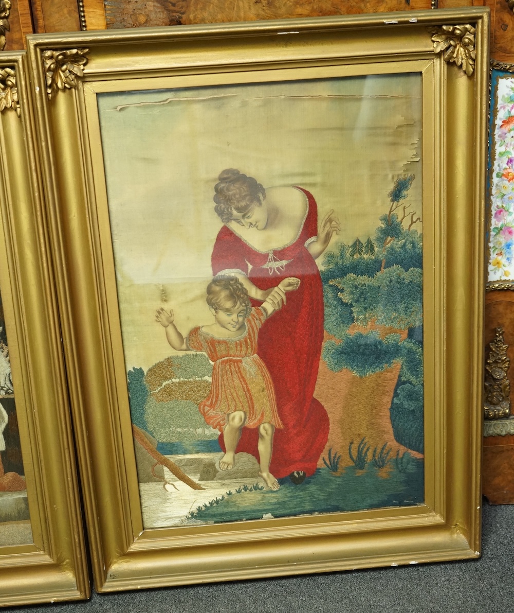 Two Regency silk embroidered and painted figurative panels. Both mother and child scences. One an intimate farmyard scene, embroidered with mother and child, flowers, a cat and pigs. The other of a mother helping her chi